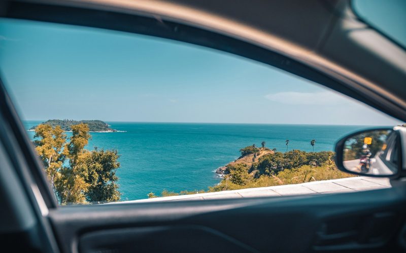 coastal view through vehicle window