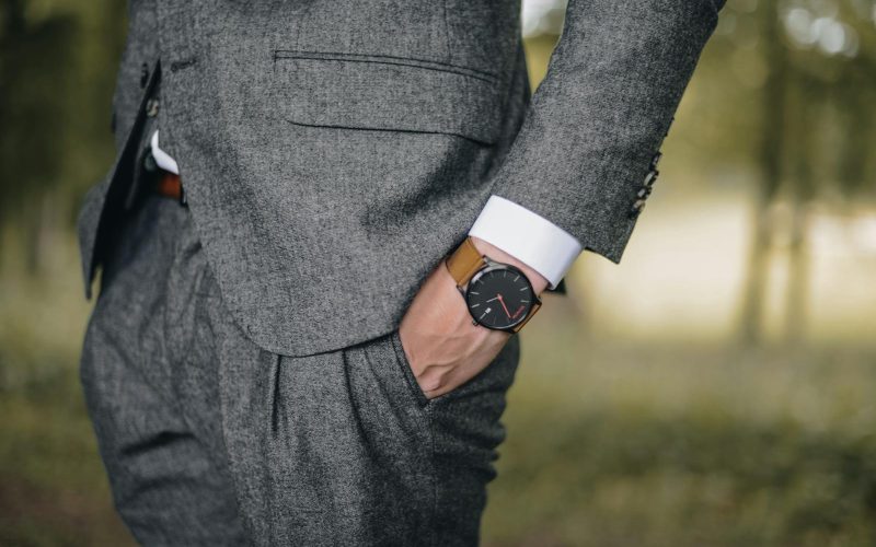 Man Wearing Watch With Hand on Pocket