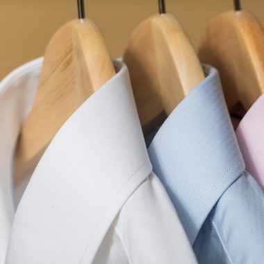 white and purple button up shirt