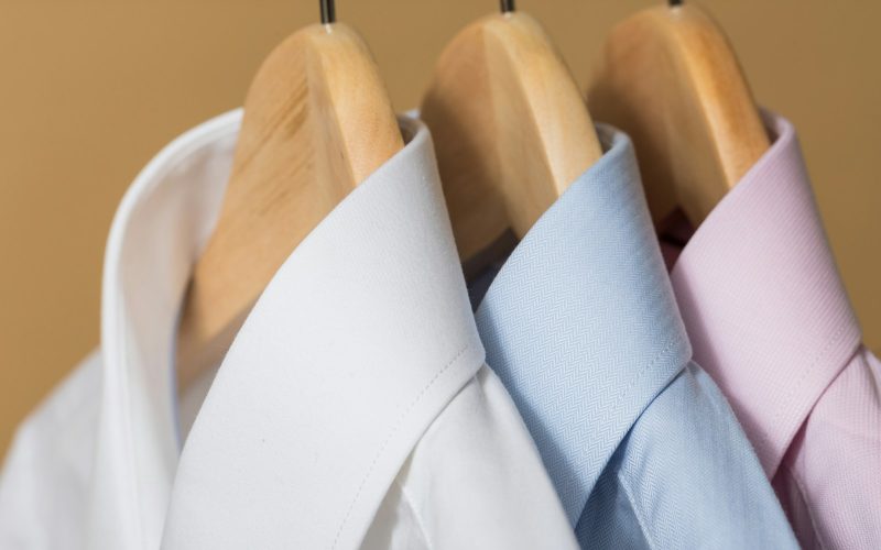 white and purple button up shirt