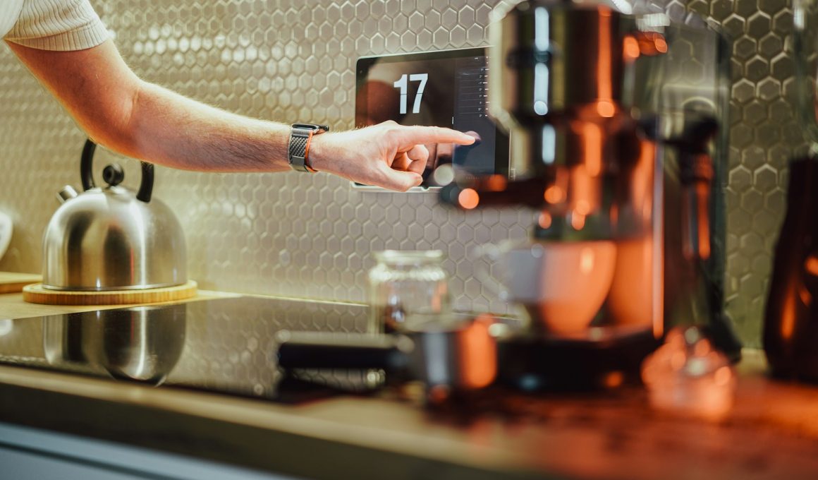 a person pressing a button on a coffee machine
