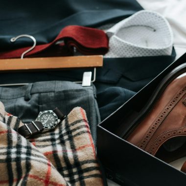 pair of brown leather dress shoes with box
