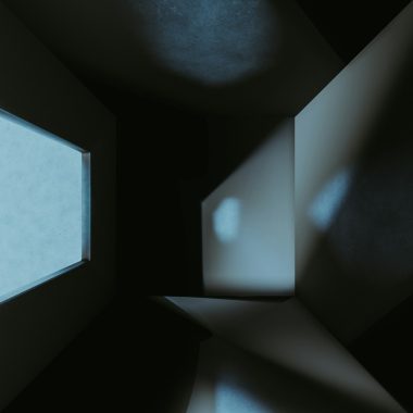 a dark room with a small window in it