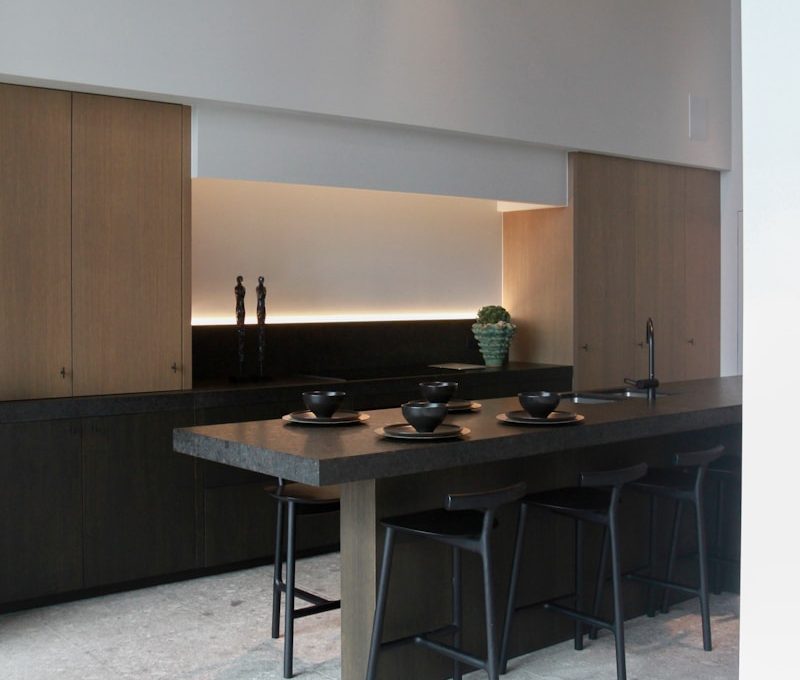 brown wooden cabinet near brown wooden cabinet