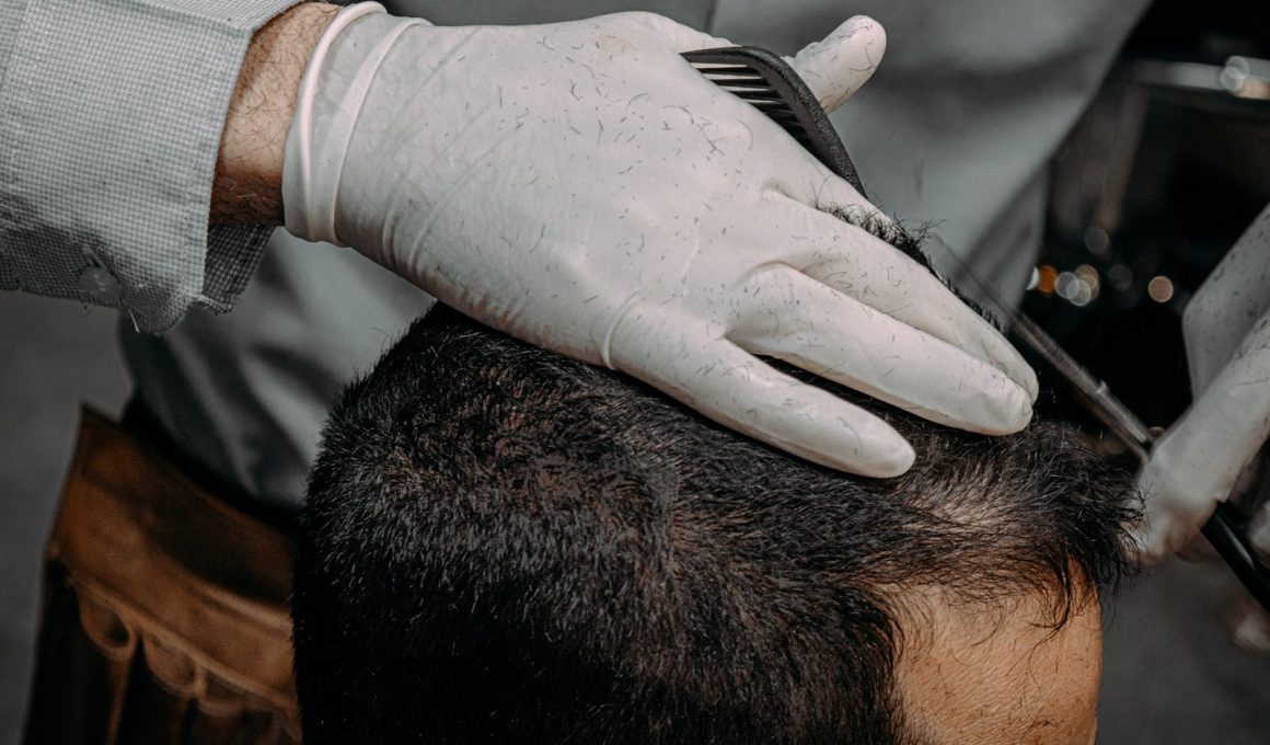 a close up of a person cutting another persons hair