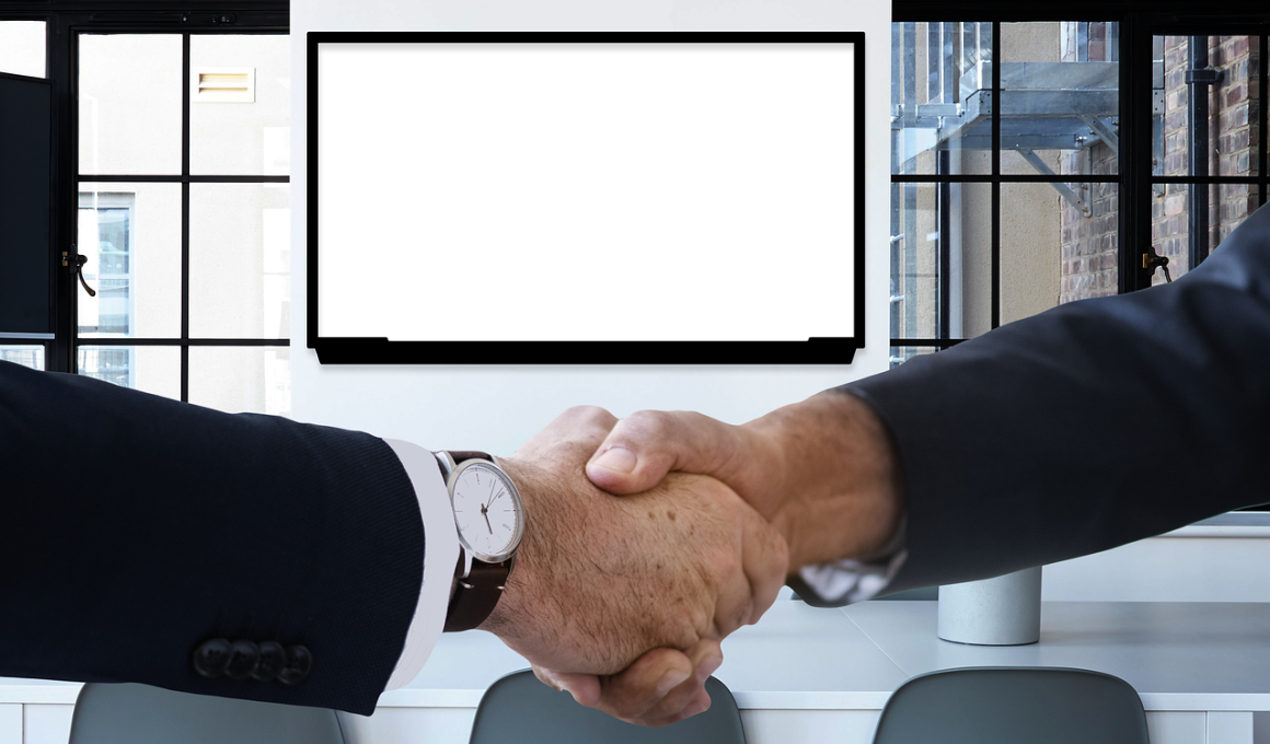 Man in gesprek met manager aan vergadertafel tijdens salarisonderhandeling